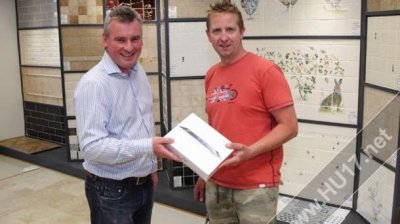 Ceramic Tile Merchants presents competition winner with iPad